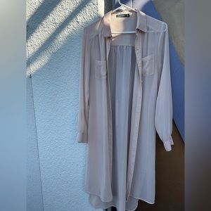 Woman’s long shear blouse